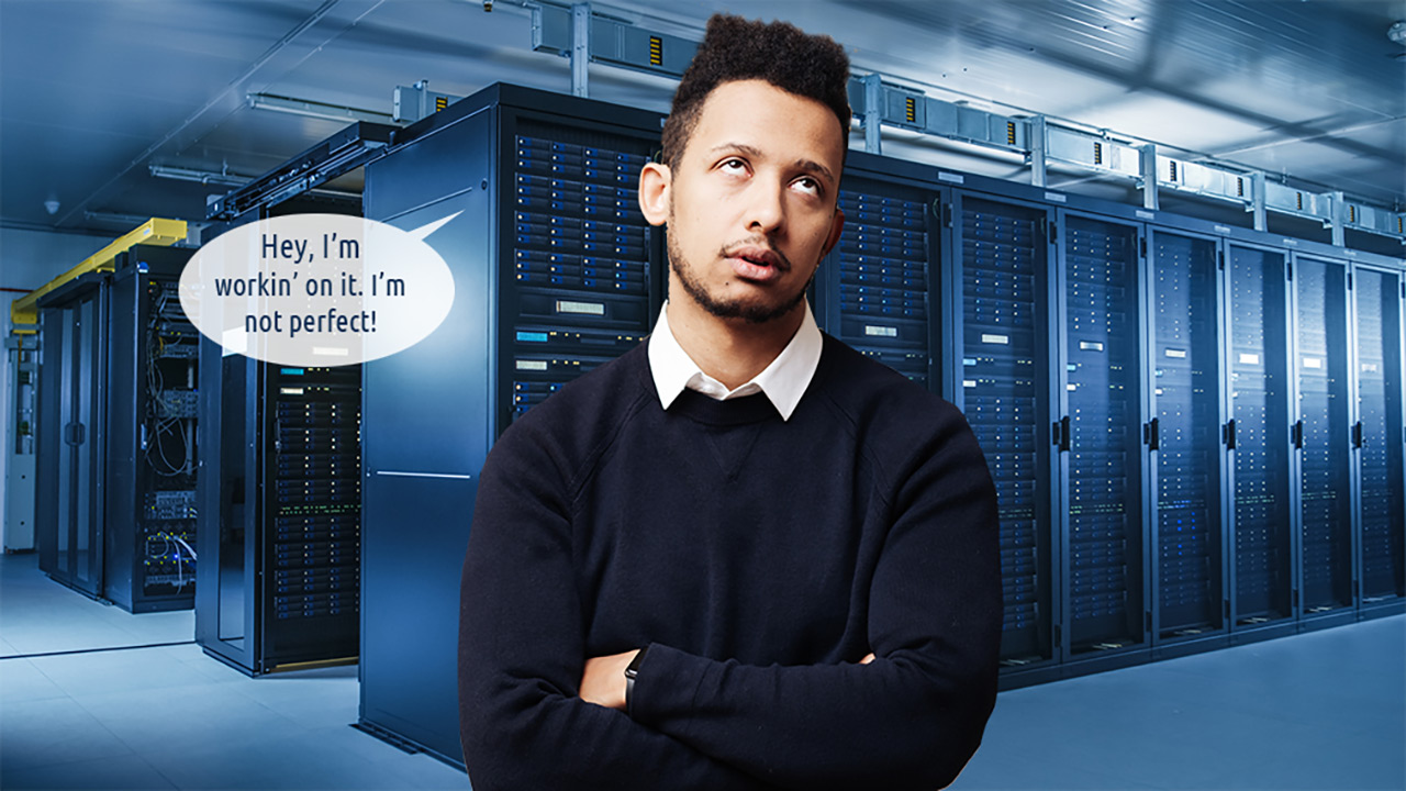 Man Rolling His Eyes at Bank of Servers