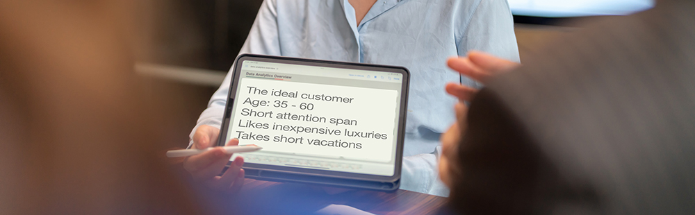 Showing laptop for writing headlines