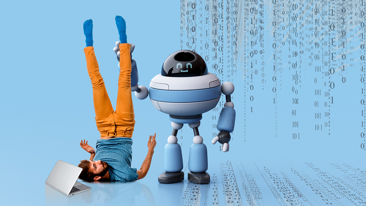 Robot holding man upside down