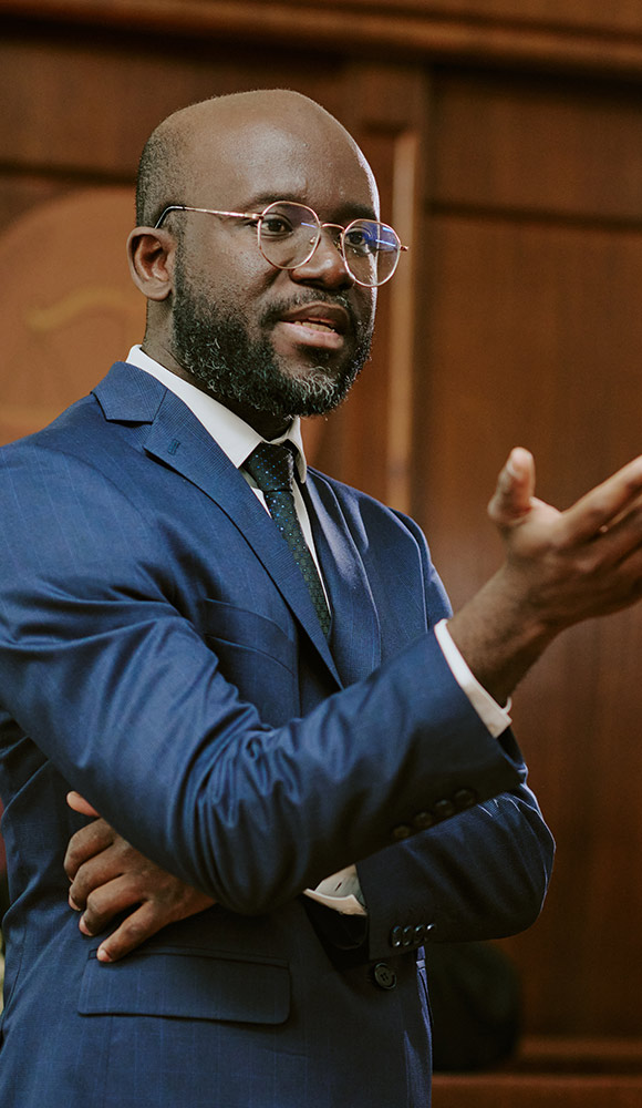African American male talking to constituents