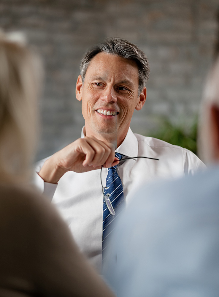 White male candidate talking to voters