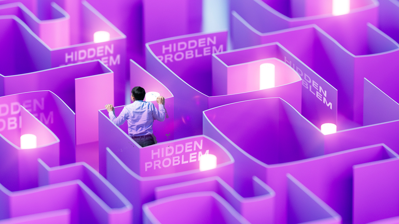 Person peeking over a wall in a maze